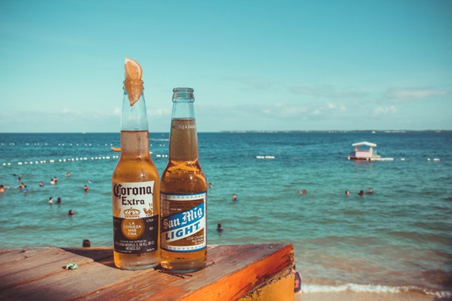 Relaxing on the beach in Cozumel with a drink and Caribbean sea view
