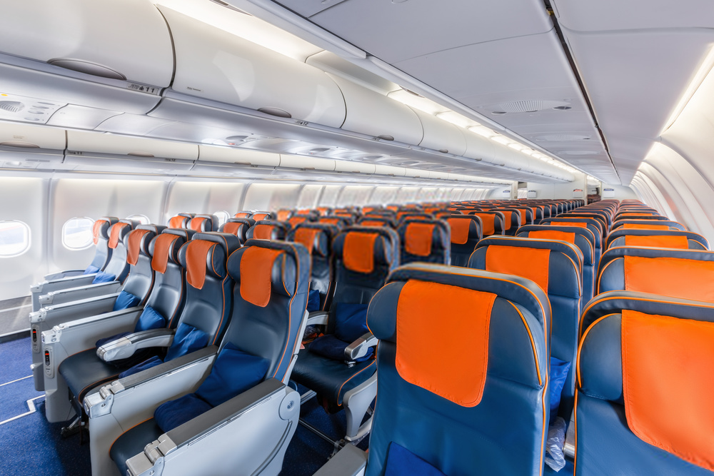 Ask politely about better seats on international flights