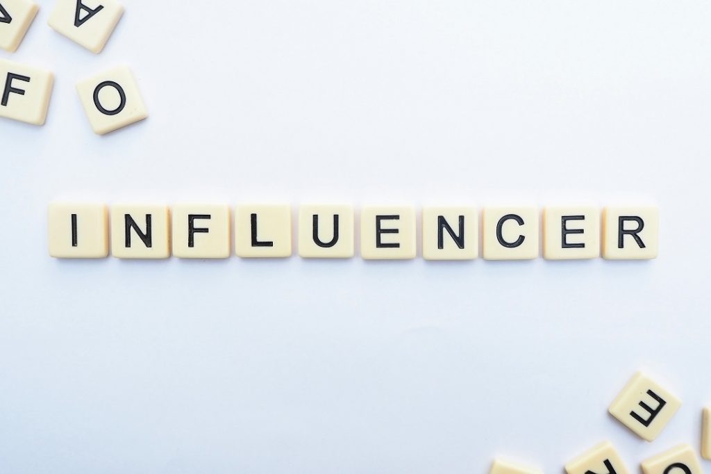 Travel social media influencer creating content