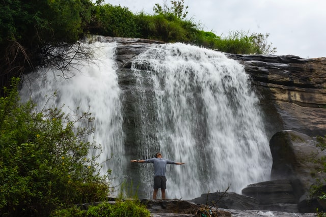 Beautiful waterfall photography with inspiring waterfall quotes and captions