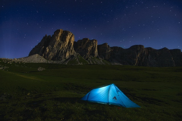 Tent pitched outdoors for a camping trip