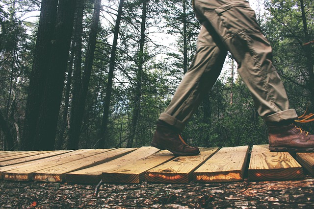Hiker wearing lightweight hiking pants on an outdoor trail